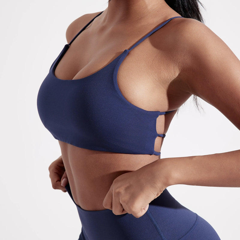 Roupa íntima de ioga para academia de cor sólida, feminina, alças cruzadas nas costas, sutiã fitness de alta resistência, top esportivo justo e abrangente com bojo