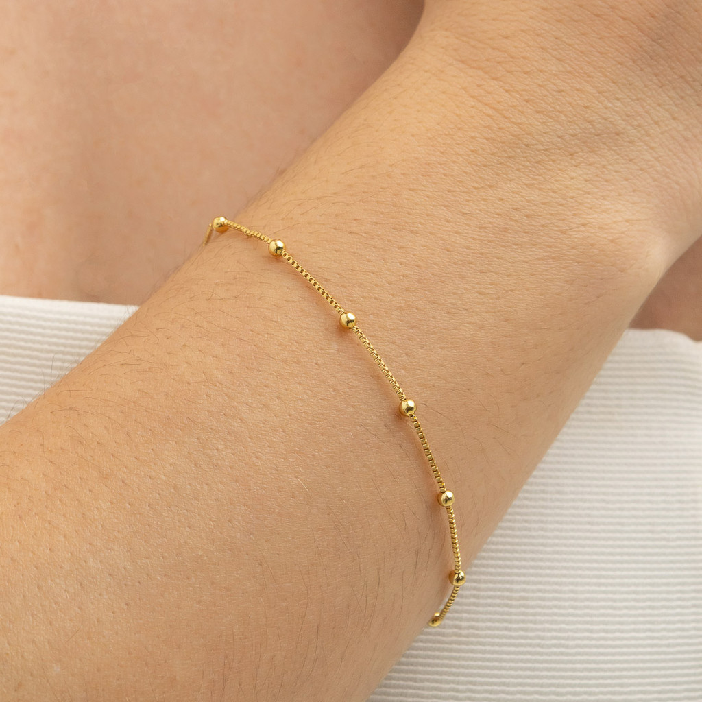 Pulseira com Bolinhas Douradas Banhada a Ouro 18K - D France Semijóias